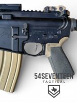 Close-up of retro AR lower receiver with mil-spec active reset FRT installed